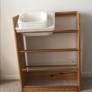 Storage shelf with bins included